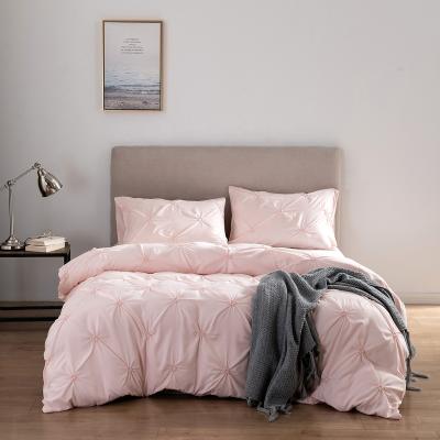 China Modern Simple Pink Jacquard Weave Folding High Capacity Queen Size Polyester Blanket 1duvet Cover+2pillowcase for sale