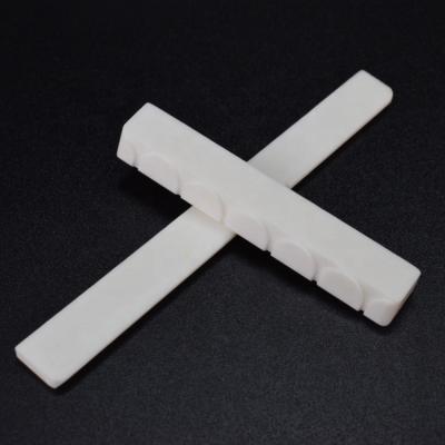 China Hot Selling Durable Professional GUITAR Musical Instrument Accessories Buffalo Bone Nut and Saddle Guitar Accessories for sale