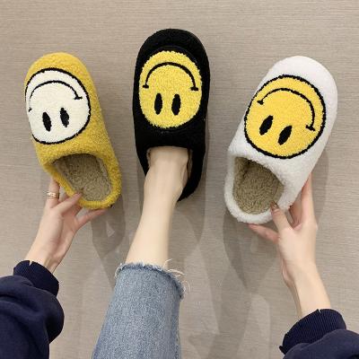 China Fuzzy Smiley Face Home Slippers Soft Warm Indoor Home Slippers Women Newest Women's Trend 2021 Fashion Plush Winter Luxury Slippers for sale