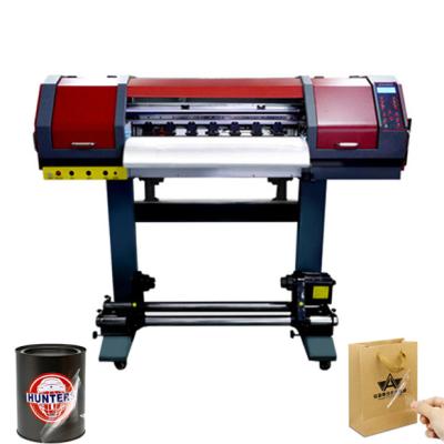 China Garment Shops Cheap 3pcs TX800 printhead use AB film UV DTF printer without laminator for logo printing for sale