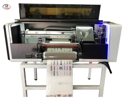 China Indoor Outdoor Advertisement Hot sales 42cm i3200 printhead  Automatic Lamination UV DTF Printers for label printing for sale