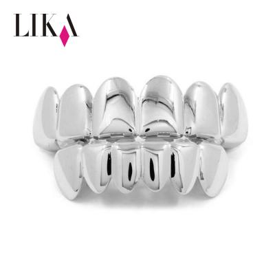 China LIKA Gold Fake Teeth Gold casual/sporty Grilz set Diamond Braces Teeth Cut Fashion teeth plated brass grillz with diamond for sale