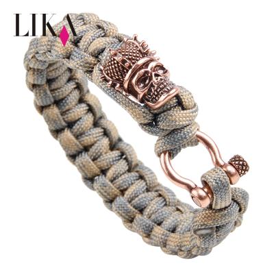 China LIKA Punk Woven Fashionable Vintage Style Pirate Skull Paracord Outdoor Survival Bracelet Metal Clasp Bracelet Charm for sale