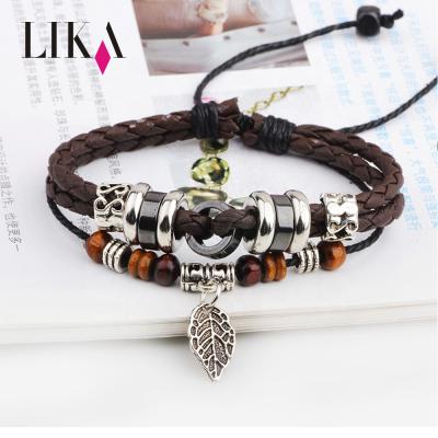 China Vintage Lika Wrap Decor Wood Bracelet Metal Clasp Bracelet Grow Leaves Retro Punk Genuine Leather Bracelet Leaf Beads Dangle Leather Rope Bracelets for sale