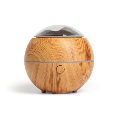 China Colorful Atmosphere Lights 7 Colors HOT Colors Led Light Aromatherapy Essential Oil Diffuser Wooden Ultrasonic Air Humidifier Scent Aroma Diffusers for sale