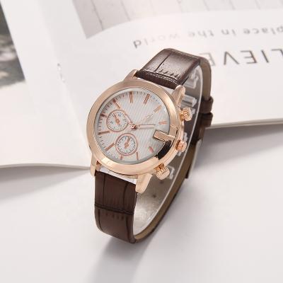 China Hot selling automatic belt clock quartz date in Southeast Asia stripe belt mounted gold case scale display calendar ring unisex watch for sale