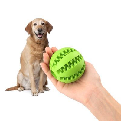 China Viable Pet Toy Natural Indestructible Soft Tooth Leak Food Cleaning Dog Toys Rubber Chew Ball Toys for sale