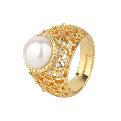 China Vintage Gold Plated White Pearl Chunky Index Unique Design Hollow Inlaid Adjustable Zircon Ring For Women for sale