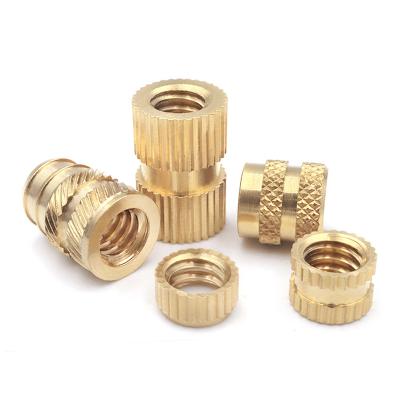 China Healthcare Camera Bracket 1/4 Copper Nut Through Hole Injection Mold Brass Knurled Nut Insert Nut for sale