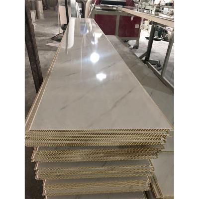 China Artistic PVC Panel Ceilings PVC Wall Panel Plastic Solid Interior Wood Paneles Peeled PVC for sale