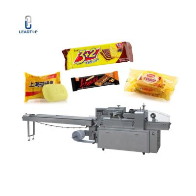 China Chocolate Bar Cake Bread Soap Auto Flow Wrapping Clothing Chocolate Bar Pillow Type Packaging Machine for sale