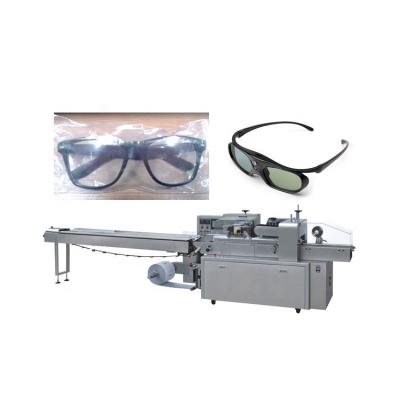 China Chemical Automatic 3D Glass Sunglasses Packing Machine For Pillow Packing With Servo Drive System for sale