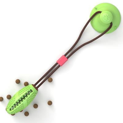 China Food Ball Chewing Dog Tug Rollover Protective Device Dispensing Rubber Toy Self Viable Game for sale