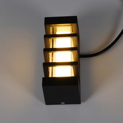 China Good Quality 7W European Modern Black Aluminum Lamp Body Energy Saving Three Color Dimming Outdoor LED Wall Light for sale