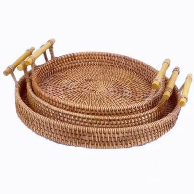 China Round Serving Tray Eco Friendly Natural Wicker Decor Fruit Bread Woven Rattan Basket For Home Storage for sale