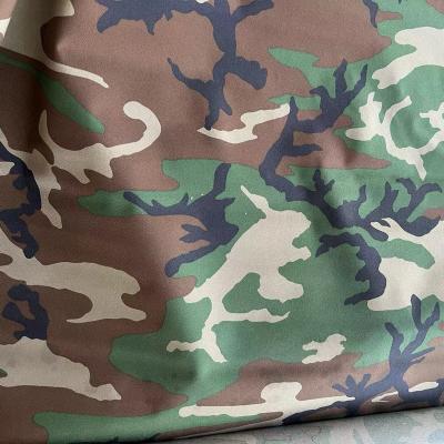 China Waterproof 900D Cordura Woodland Camouflage Nylon Fabric Waterproof Fire Resistant For Backpack for sale