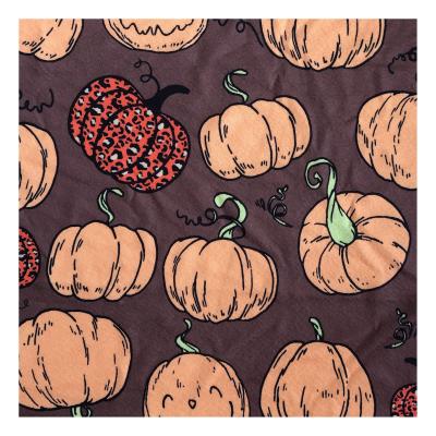 China Stretch Milk Silk Fabric Halloween Pumpkin Printing Decorative Fabric 100% Polyester for sale