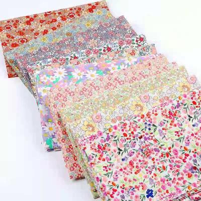 China Stain Repellent Fabric French Printed Pure Cotton Small Fresh Printed Garment Snowflake Printed Cotton Fabric for sale