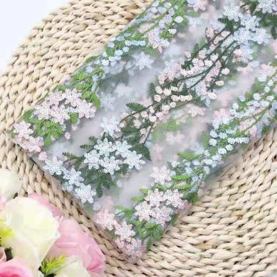 China Breathable Embroidery Rattan Flower Lace Mesh Vertical Fabric Wedding Dress Fabric for sale