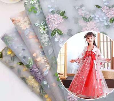 China Anti-static floral fresh lace embroidery fabric mesh spring lace fabric embroidery fabric small and summer dress for sale