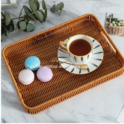 China 2022 Sustainable New Arrive Bread Rattan Basket Rattan Vegetable Storage Eco-friendly Food Serving Tray Handicrafts Tray for sale