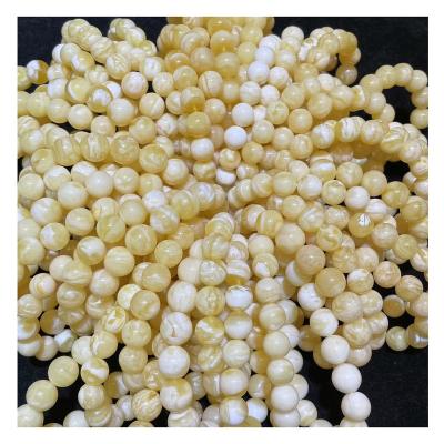 China High Quality Polishing Russian Amber Beads The Factory Outlet Natural White Amber Bead Factory Outlet Diameter Is 10-12mm Hand for sale