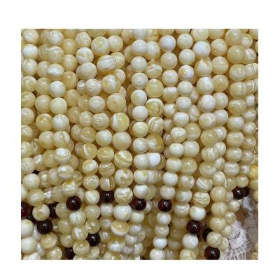 China Outlet 8-10mm diameter factory outlet 8-10mm diameter unique white rare and opaque Baltic amber wax natural tiger polishing exquisite skin for sale