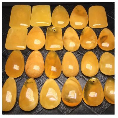 China Factory Outlet Natural Russian Amber Yellow Amber Pendant Beautiful Polishing Opaque Color No Crack Quality for sale