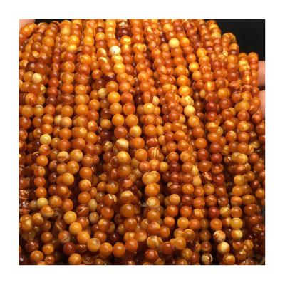 China High Quality Polishing Amber Beads The Factory Outlet Natural Baltic Amber Old Russian Amber Has Clear Lines With A Diameter Of 6 for sale