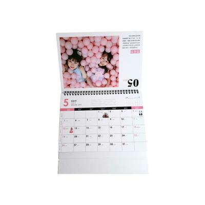 China Newest Table Calendar 2022 Desk Calendar Holder 13 Pages With Customized 250gsm Art Paper Design Size 260*140mm for sale