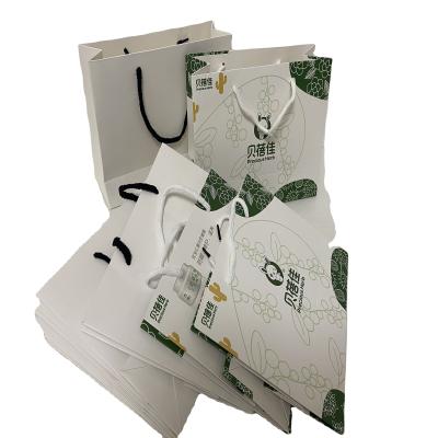 China Popular Durable Multifunctional Cardboard Paper Handle Bags Tote Bag Eco Friendly Paper Bag Manufacturer for sale