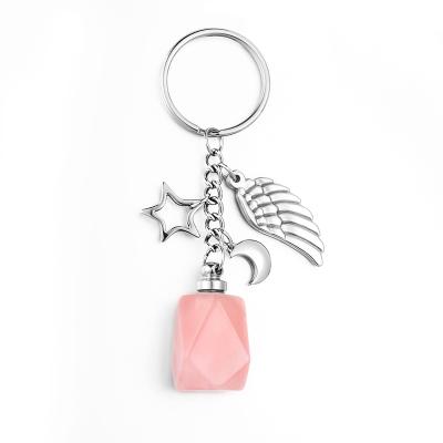 China skin-friendly & XiuYuan Stainless Steel Crystal Pink Quartz Keychain Design Ash Holder Cremation Urn Jewelry Eco-Friendly Memorial Keepsake for sale