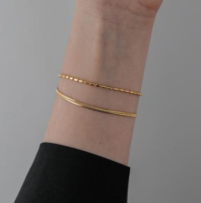 China skin-friendly & Eco-friendly 18K Bulk Gold Stainless Steel Double Layer Round Snake Chain Bracelet Women Jewelry for sale