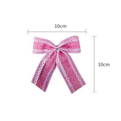 China Yiwu Christmas Tree Gift High Tenacity Poly Iron Wired Edge Burlap Ribbon Bow For House Door Trimming for sale