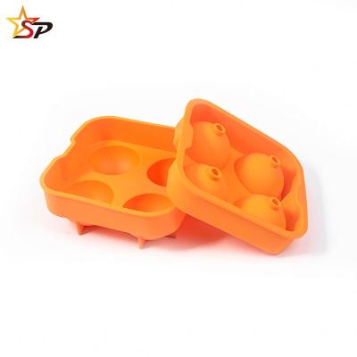 China Sustainable Ice Cube Silicone 4 Hole Ice Hockey Cube Maker Form Chocolate Mold Tray Ice Cream for sale