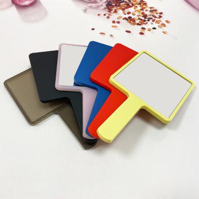 China Moq Wholesale Cheap Wholesale Low Price Custom Plastic Hand Mirror Logo Hand Held Makeup Mirror Custom Made for sale