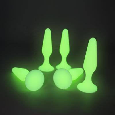 China Strong suction cup to make your hands free glow in the dark luminous silicone butt anal plug set with suction cup for sale