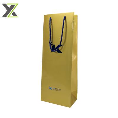 China Recyclable Custom Golden Paper Stamping Foil Logo Wine Gift Shopping Paper Bags for sale