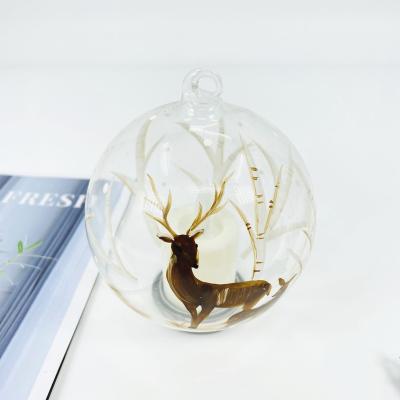 China Home Decration Hanging Type Glass Ball With Fake Candle For Christmas Decoration for sale