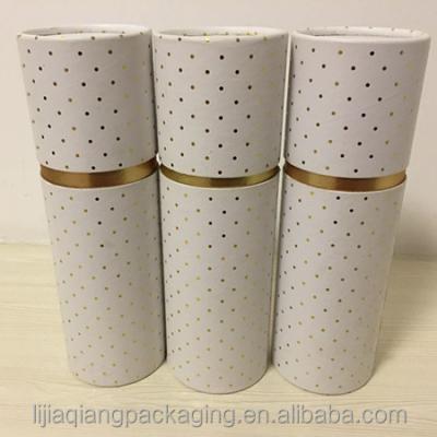 China Exquisite Materials Gold Stain Recycled Glossy White Paper Tube Packaging With Gold Paper Inside for sale