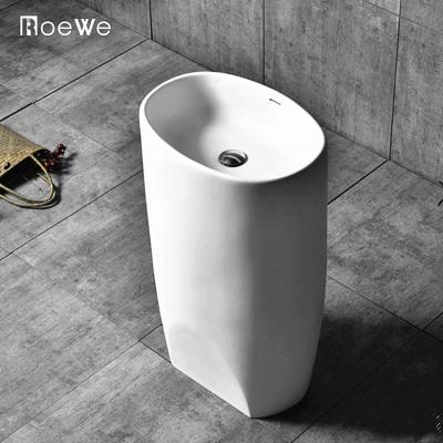 China Modern Freestanding Solid Outdoor Bathroom Pedestal Sink , Oval Hand Wash Basin Cast Stone Composite Resin Floor Standing Wash Basin for sale