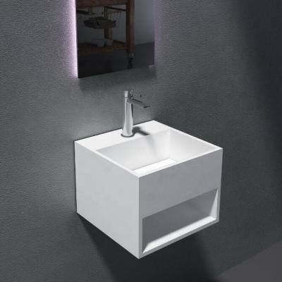 China Modern wallhang solid surface washbasin cast bathroom stone sink artificial stone washbasin for sale