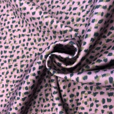 China Viable Hot Selling Pink 100% Polyester Leopard Print Fabric For Clothes Dressing for sale