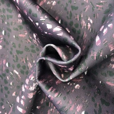 China Sustainable Fashion Design Printed Stretch Polyester Sequin Knitting Fabric for sale