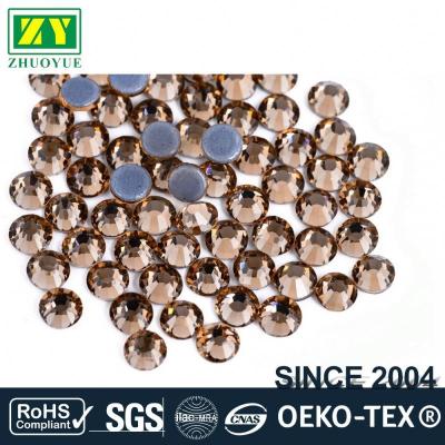 China Colorful Flatback Hotfix Lead Free Crystal Rhinestone MC DMC Hotfix Strass Stone For Wedding Dress Skirts for sale