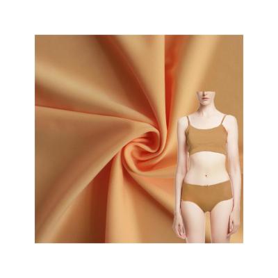 China Wholesales 2021 Fashional New Design Nylon Stretch Spandex Textile Microfiber Fabric Nylon Stretch For Swimwear for sale