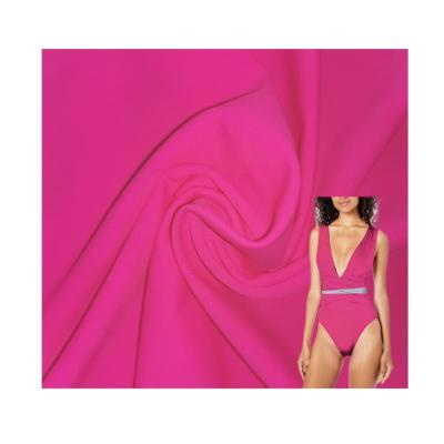 China Stretch Stretch Four Way Warp Knitted 82 Neon Spandex 18 Nylon Fabric For Swimwear With In Stock Colors for sale