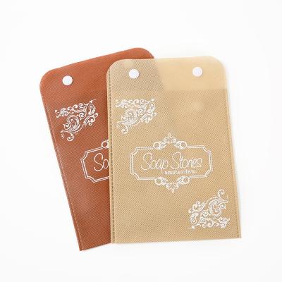 China Feature Wholesale Custom Non Woven Logo Reusable Shopping Tote Bag Storage Bags for sale