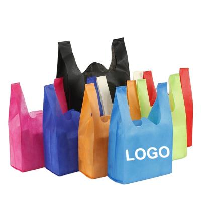 China Eco-friendly Cheap Reusable W Cut Non Woven Supermarket Tote Grocery Shopping Carry Bag T-shirt Vest for sale