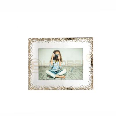 China Home decoration fancy gold home photo view children picture frame on the desk of the office home glass picture frame for sale